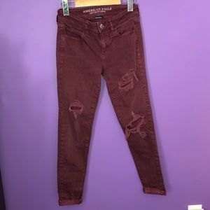 American Eagle ripped burgundy jeans